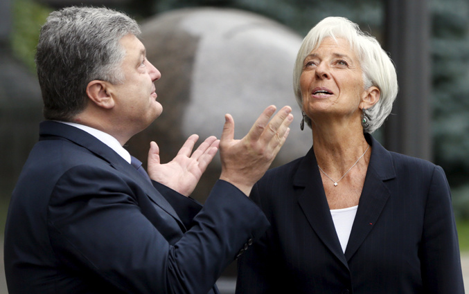 Президент Украины с директором Международного валютного фонда Кристин Лагард. «Петр Порошенко, кажется, еще не понял, что отделаться общими словами уже не получится»